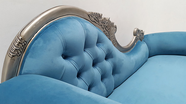 blue italian sofa with wood