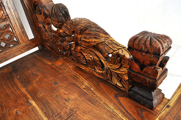 Indonesian ethnic day bench with wood carvings