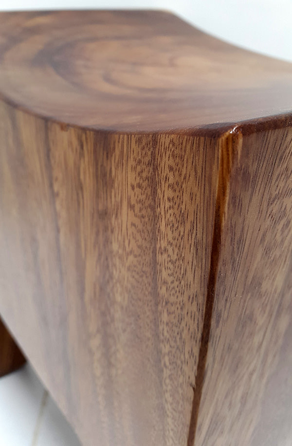 curved wooden stool with semi gloss finish