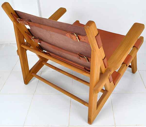 natural teak and brown leather lounge chair