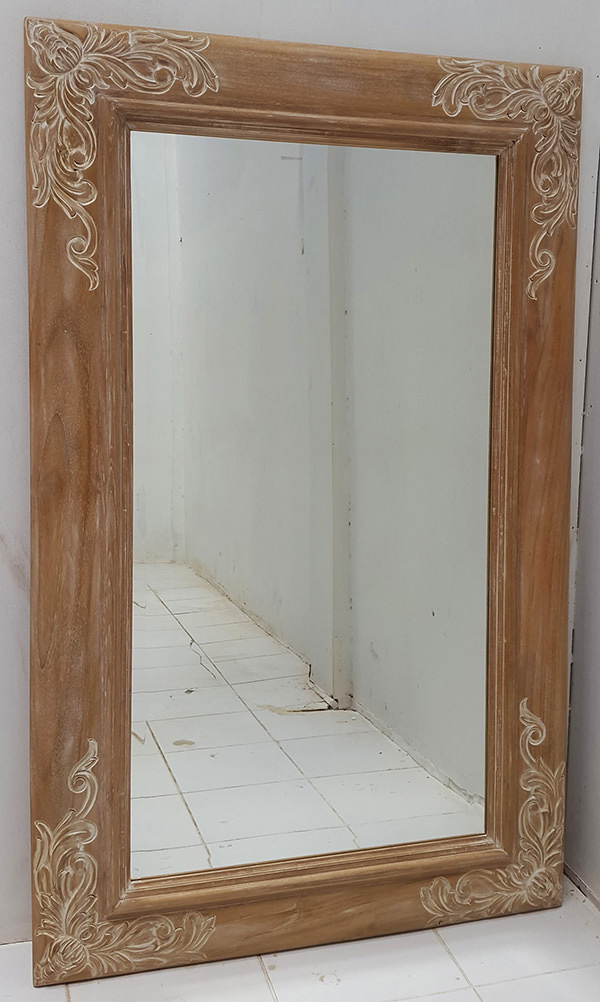 carved wooden mirror