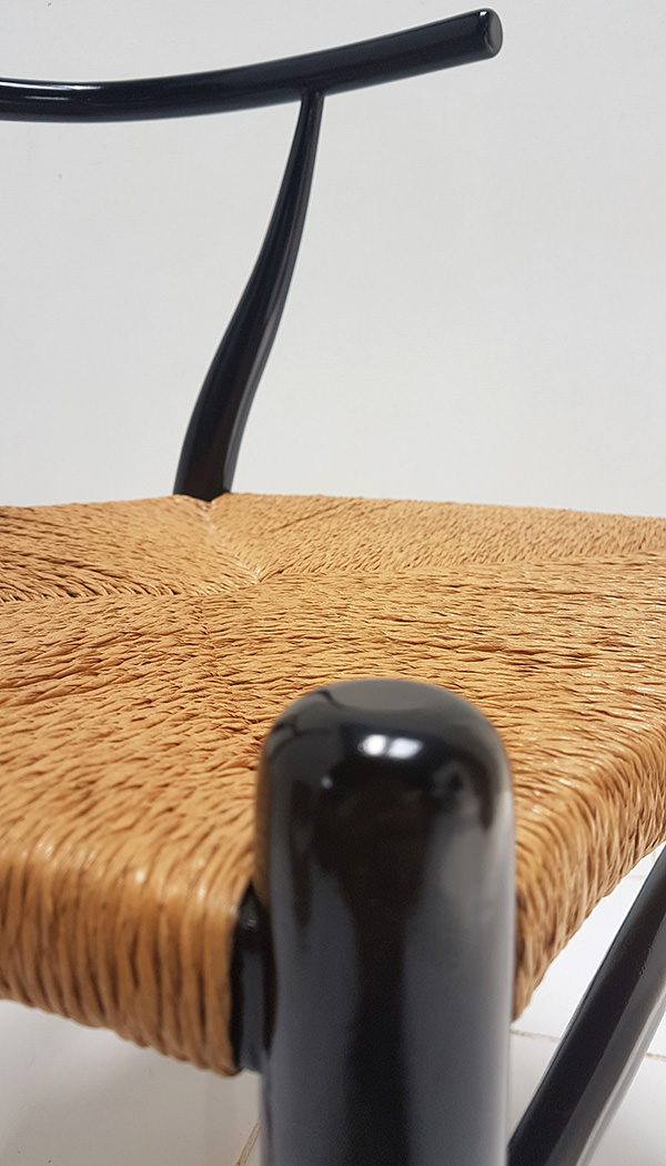 Scandinavian rattan and black wooden chair