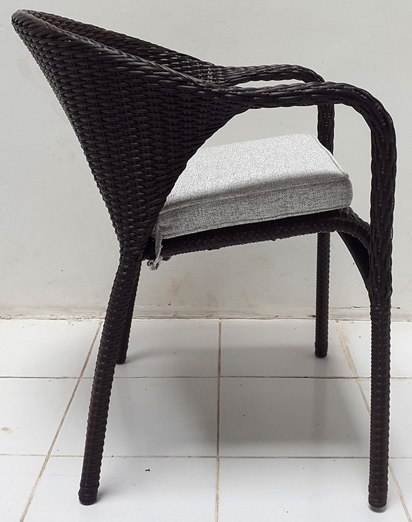 synthetic rattan armchair with cushion