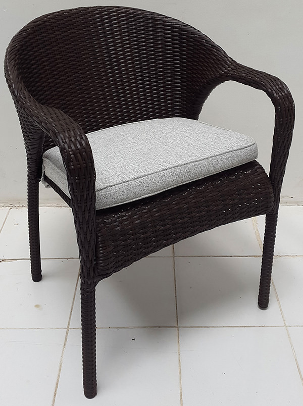 black synthetic rattan armchair with cushion