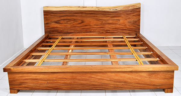 raw wooden bed