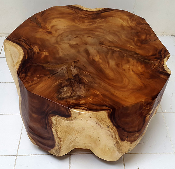 solid wooden table with natural shapes