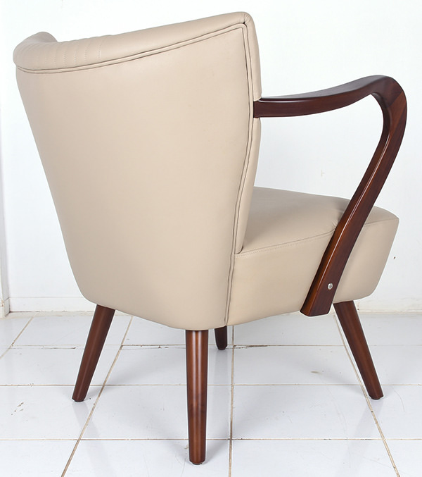 classic mid-century French armchair with mahogany arms and genuine leather upholstery