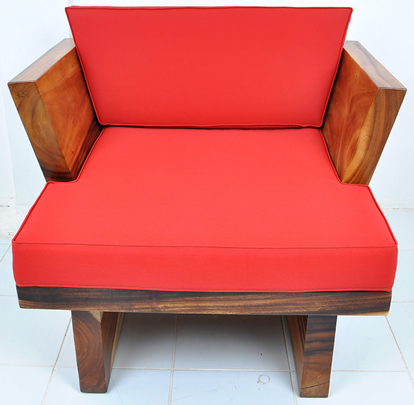 scandinavian suar seat with red upholstery