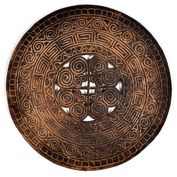 round wooden wall decor with black burnt charcoal color