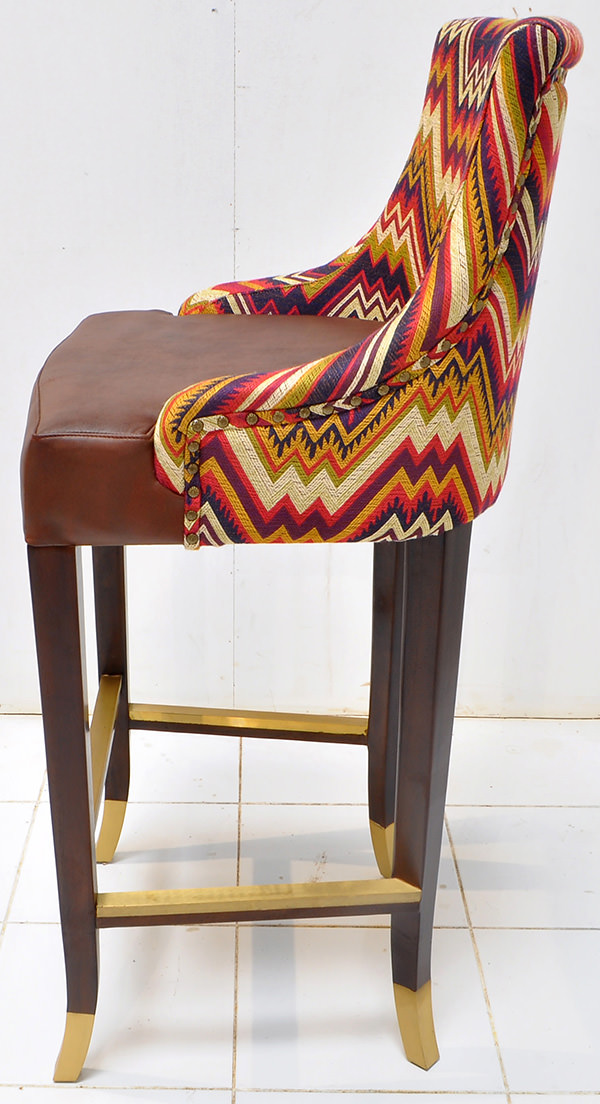 Peruvian restaurant bar seat with pattern fabric and brown leather