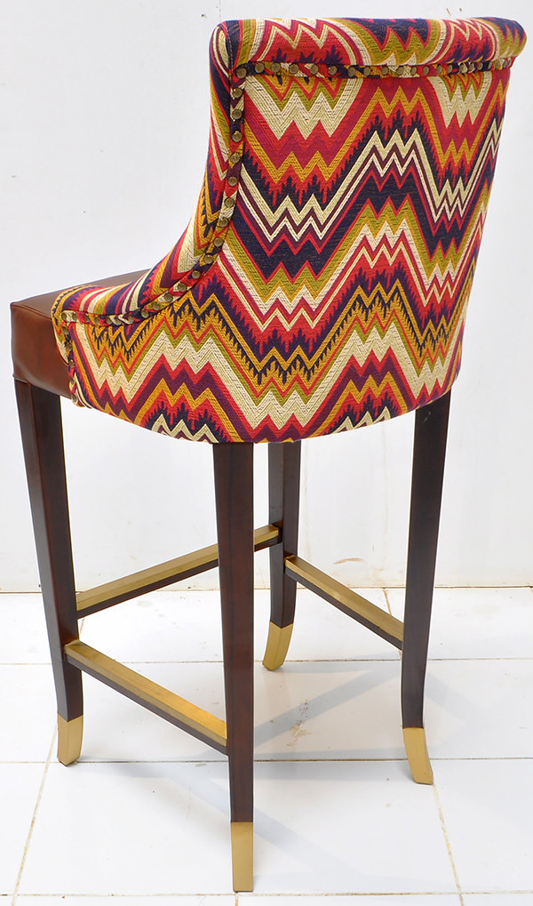 Peruvian restaurant bar seat with pattern fabric and brown leather with vintage finish