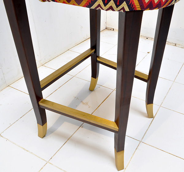 Peruvian restaurant bar seat with brass fittings