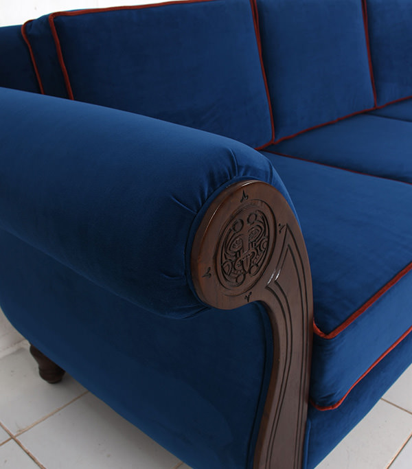 velvet sofa with wooden arm