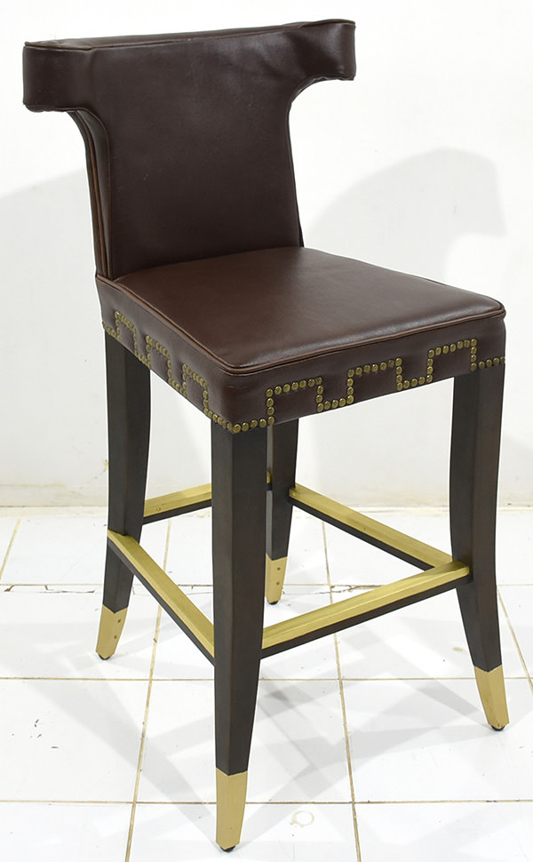 bar chair with recycled genuine leather and brass feet rest for Monte Carlo restaurant