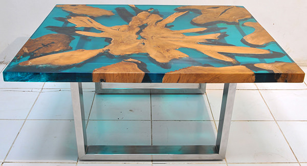 solid teak root and resin coffee table with stainless steel legs