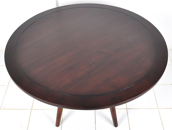 dark brown solid mahogany round restaurant table with Danish design glossy finish and slender legs