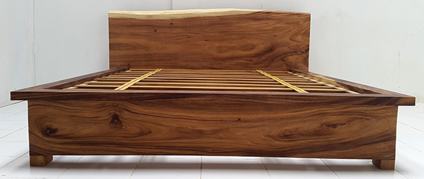 suar bed frame with headboard with a natural shape