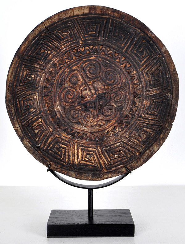 Reclaimed standing wooden decor with carved ethnic traditional Indonesian pattern