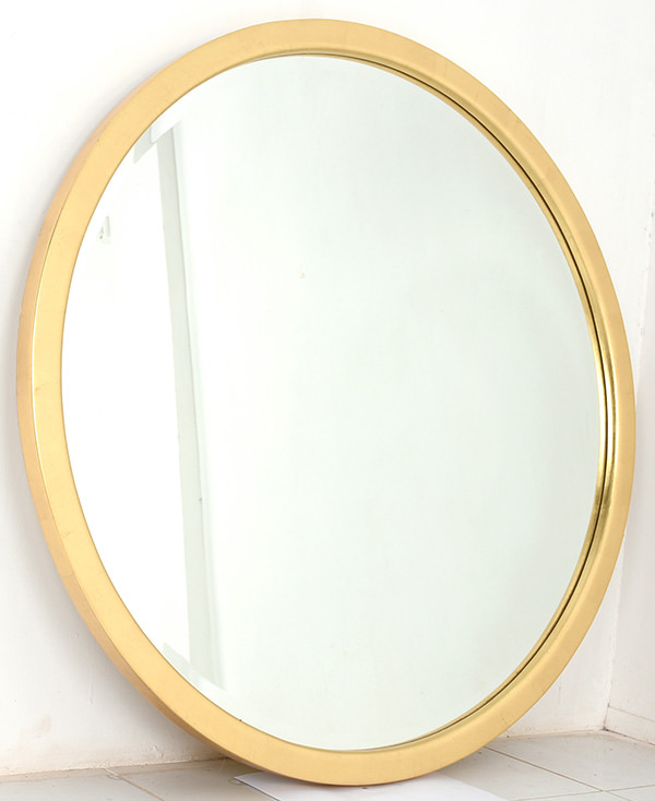 round golden mirror