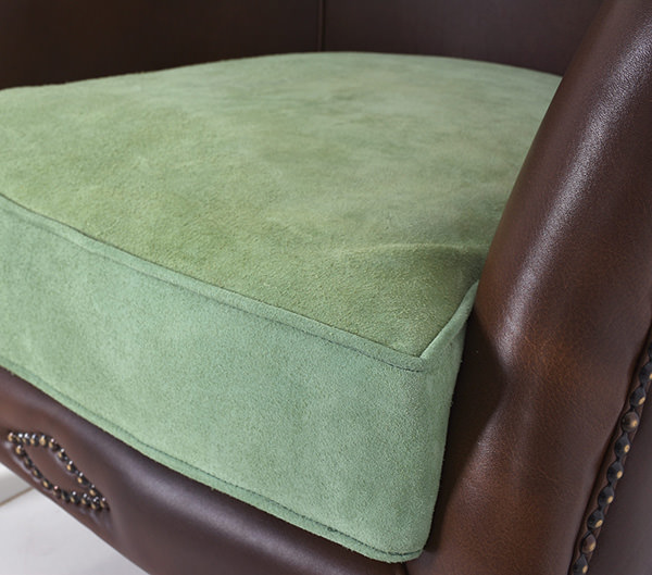genuine distressed leather with green suede cushion