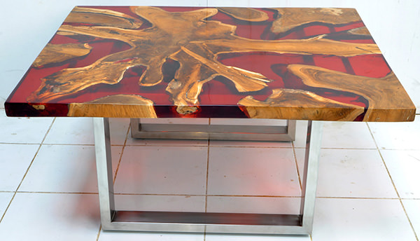 solid teak root and red resin coffee table with square glossy stainless steel legs