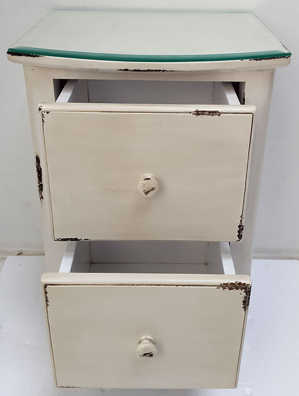 white distressed mahogany night table with glass top and two drawers