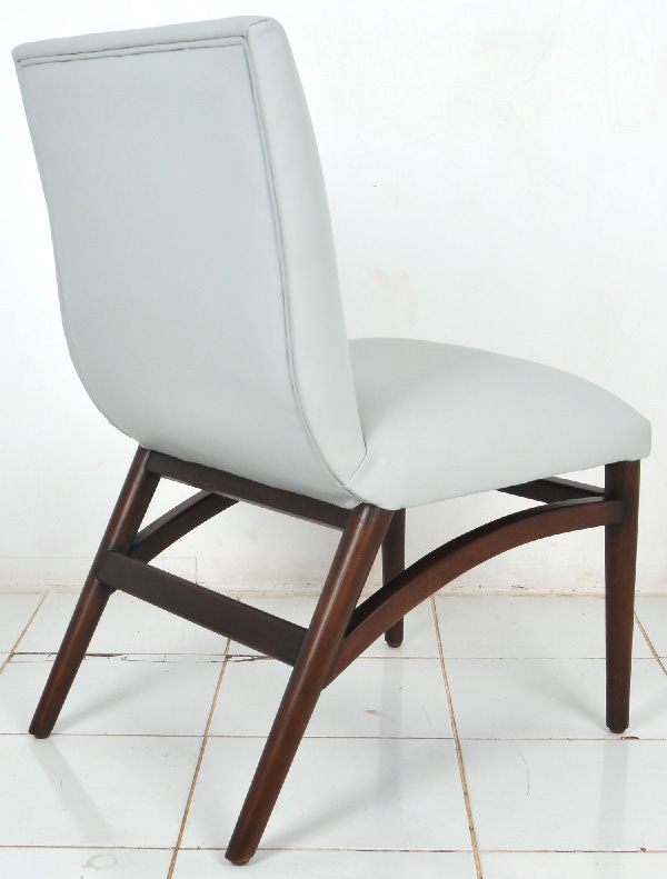 danish dining chair with curved feet connectors and leather upholstery