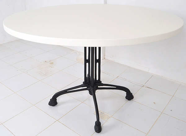 round bistro table with cast iron table legs with white table top