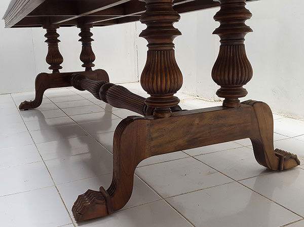 teak dining table with white marble top and vintage finish