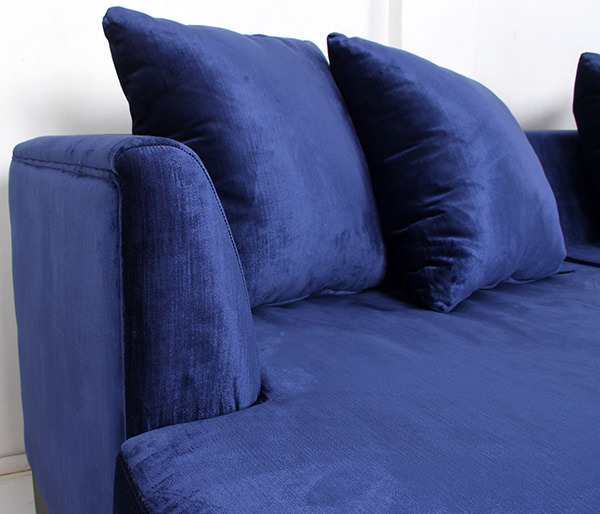 Blue velvet sofa