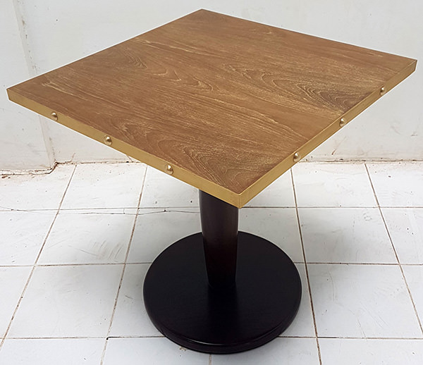 square restaurant table with brass edges