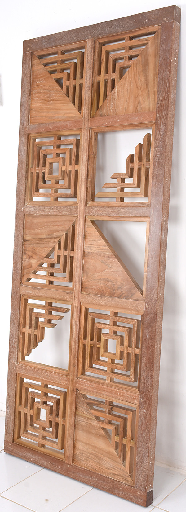 teak wooden divider with geometric pattern