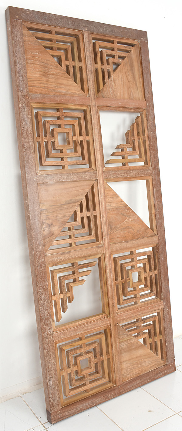 teak wooden divider with geometric pattern and natural finish