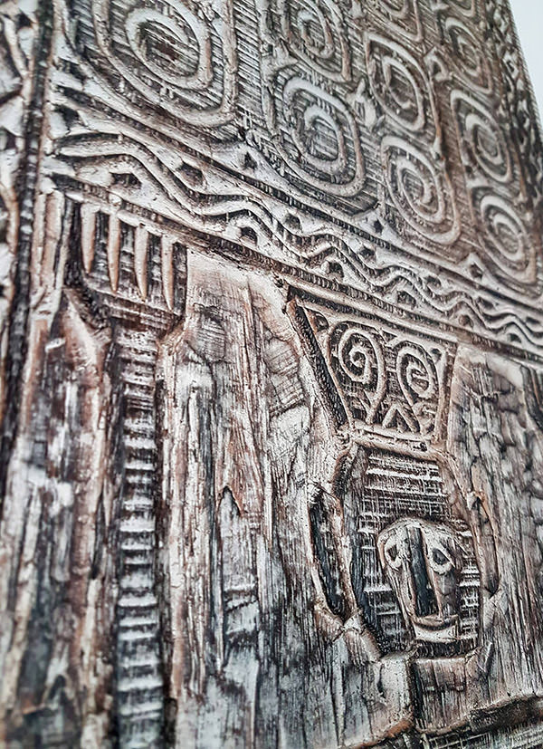 detail of a primitive wood carving