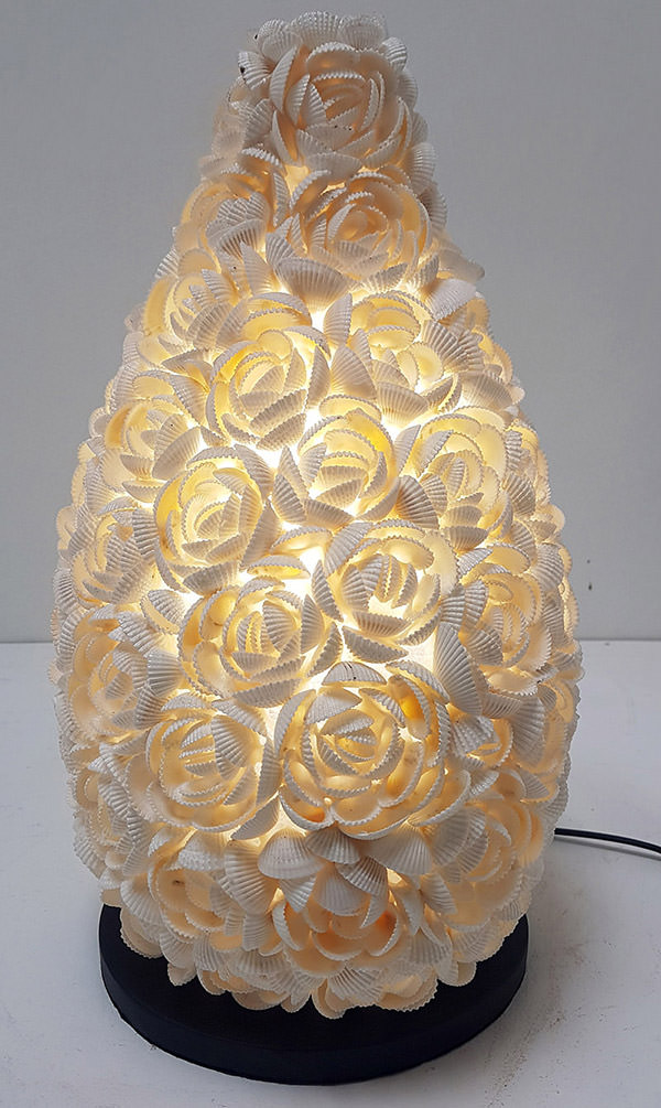 detail of shells lamp with flower pattern