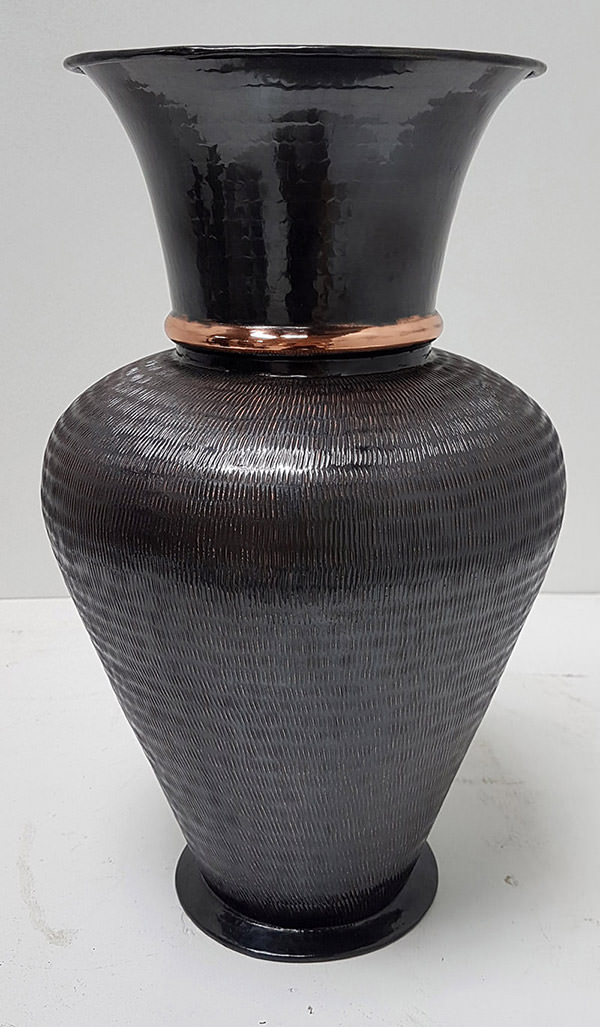 hand hammered black and orange copper vase
