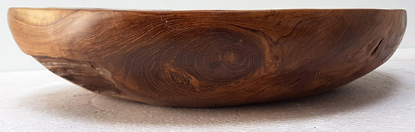 side view of a teak plate with copper insert