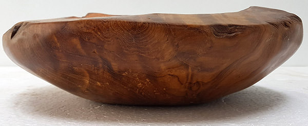 detail of a teak bowl with copper insert