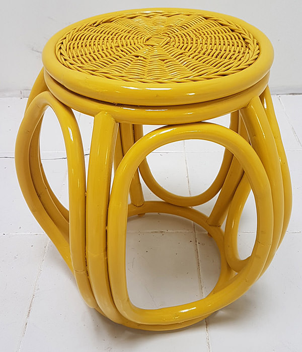yellow cane and rattan side table