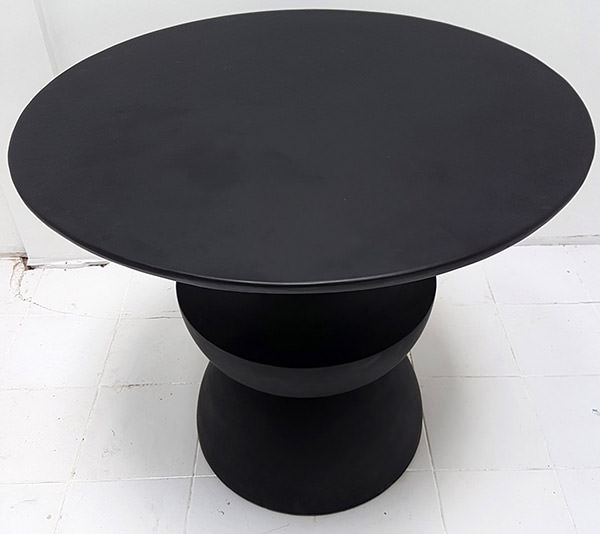 teak round table for the interior design showroom in jakarta