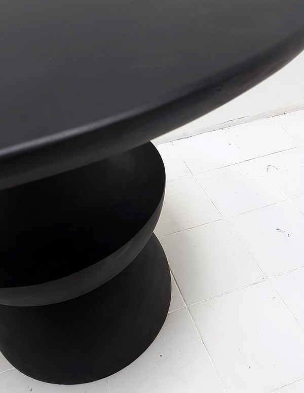 detail of the black designer teak table
