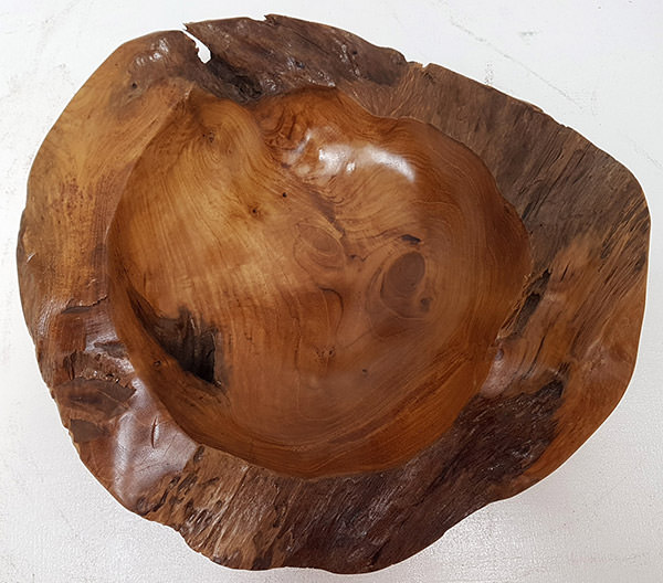 teak plate with a natural shape