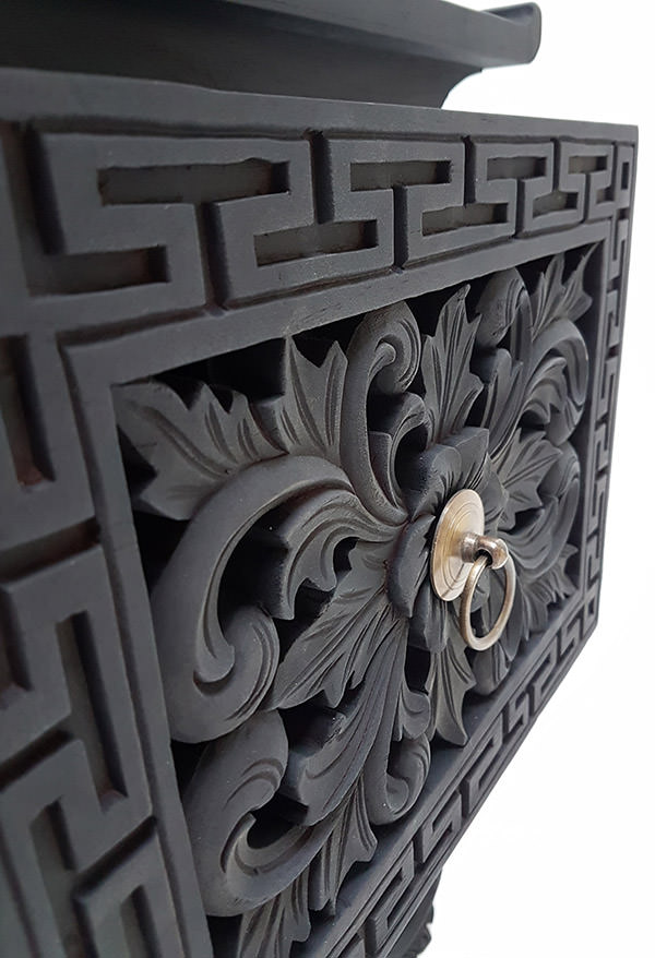 teak drawer with handmade carvings
