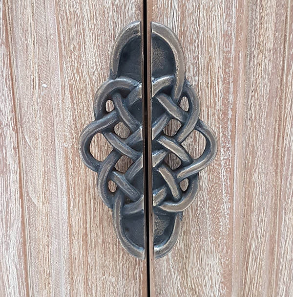 metal handle of a bespoke teak console