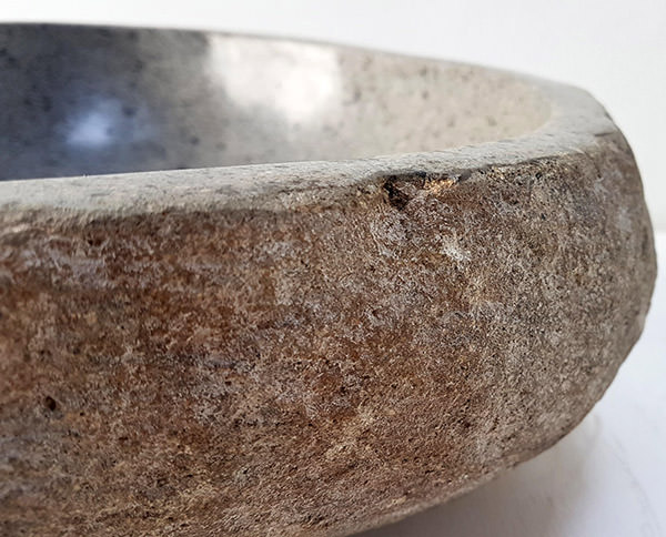 river stone wash basin with natural finish