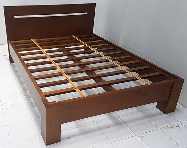 teak bed with brown finishing