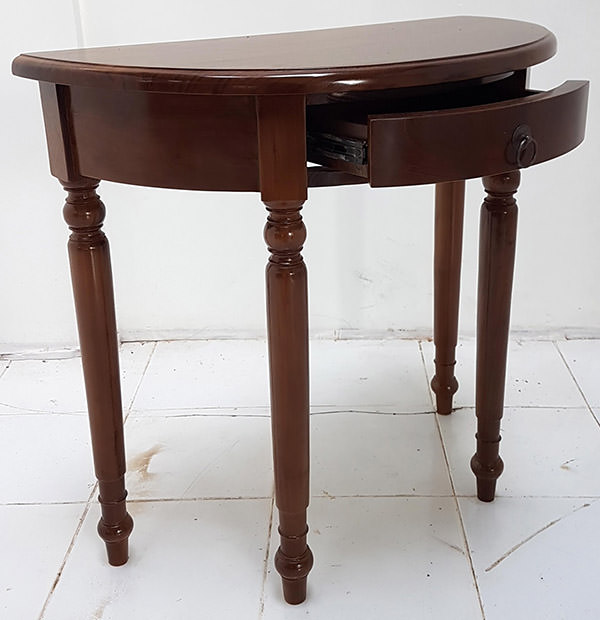 dark brown half round teak console with drawer