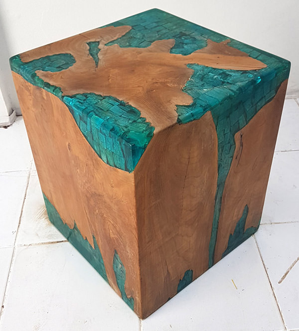 stool made out of suar and blue resin with drift wood inserts