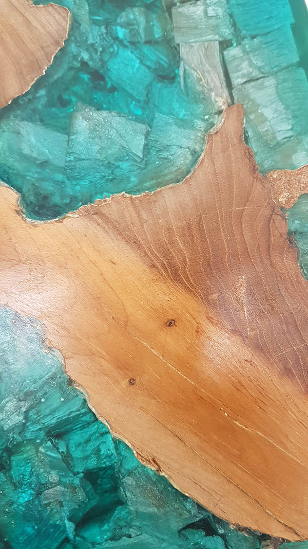 details of suar and blue resin with drift wood inserts