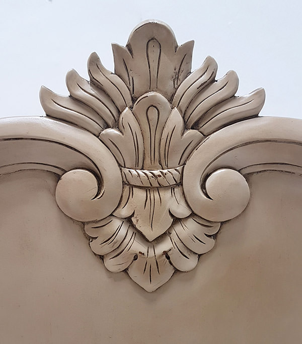 handmade wood carving with distressed finishing